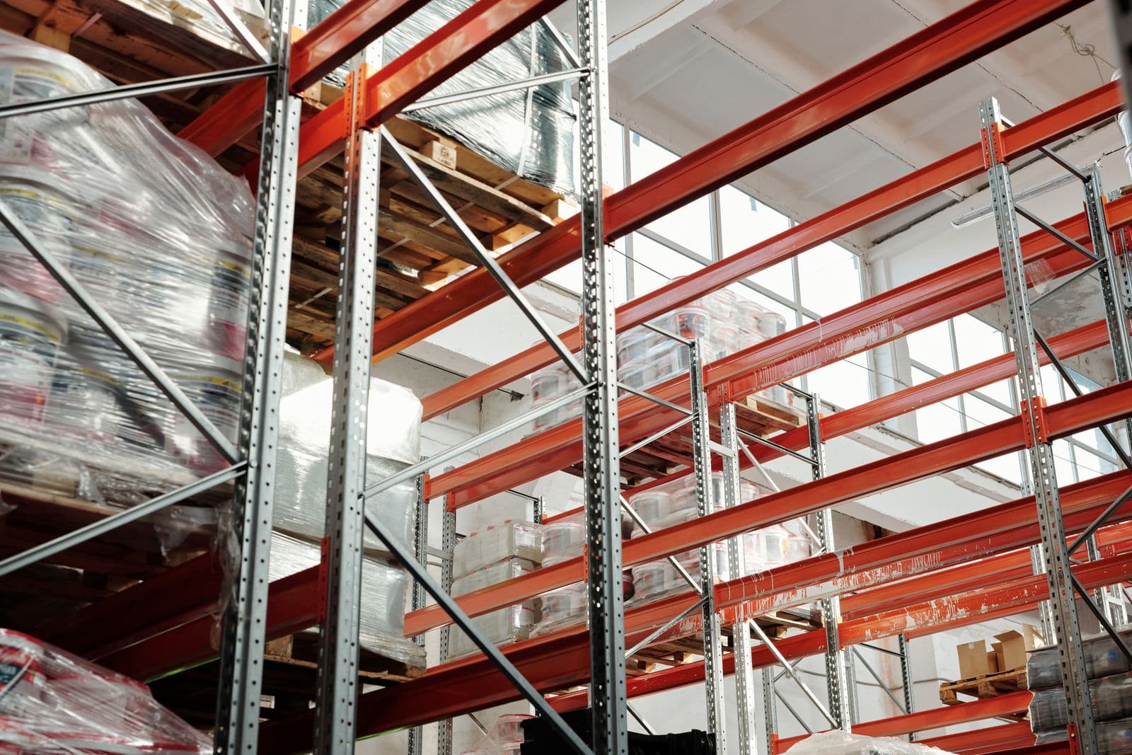 Packaged lubricants on racking in the LUBE-tech warehouse